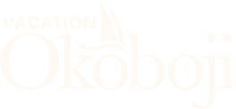 The text "VACATION Okoboji" with a sailboat icon centered above the letter 'o' in white on a black background.